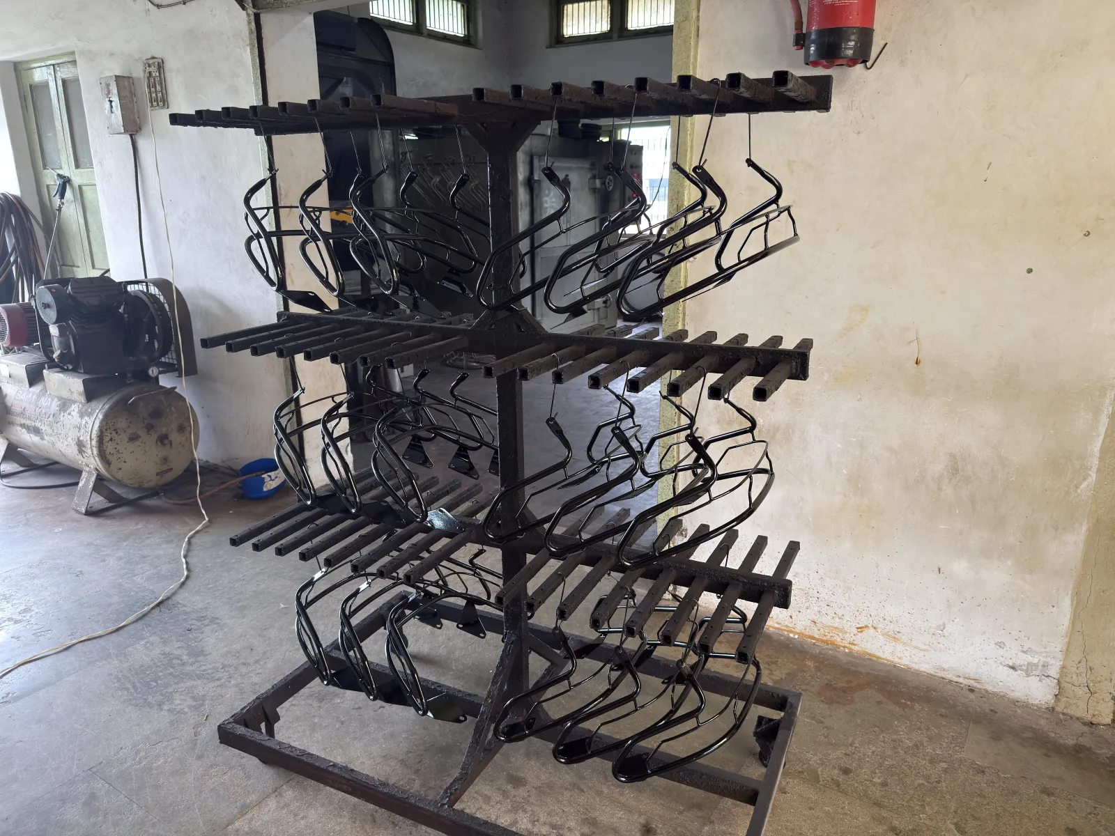 Parts racked before powder coating